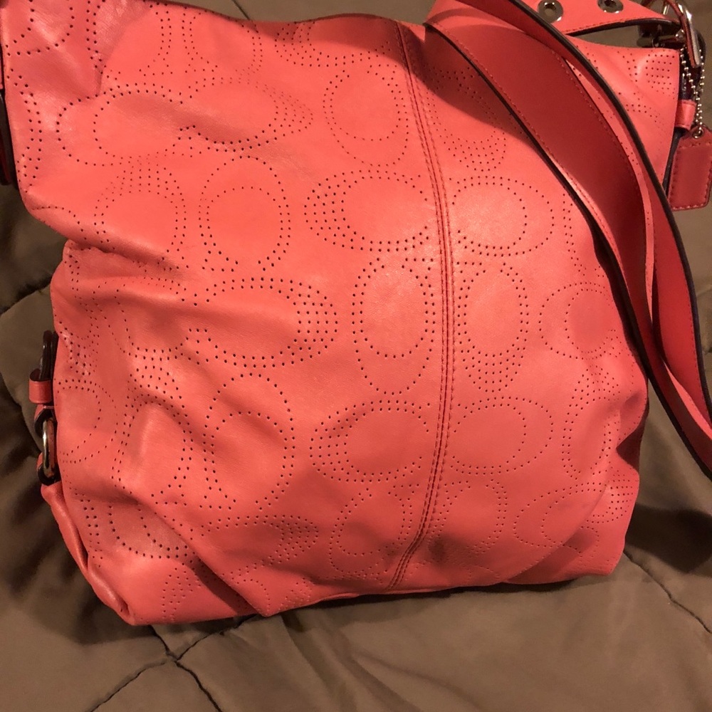 Blush /pink perforated Coach purse